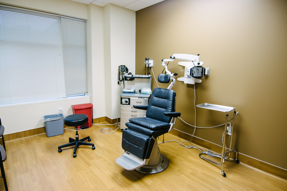 ENT exam room with patient chair and diagnostic equipment at Peak ENT's Brighton, Colorado office